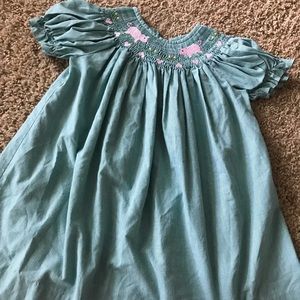 Smocked dress pig